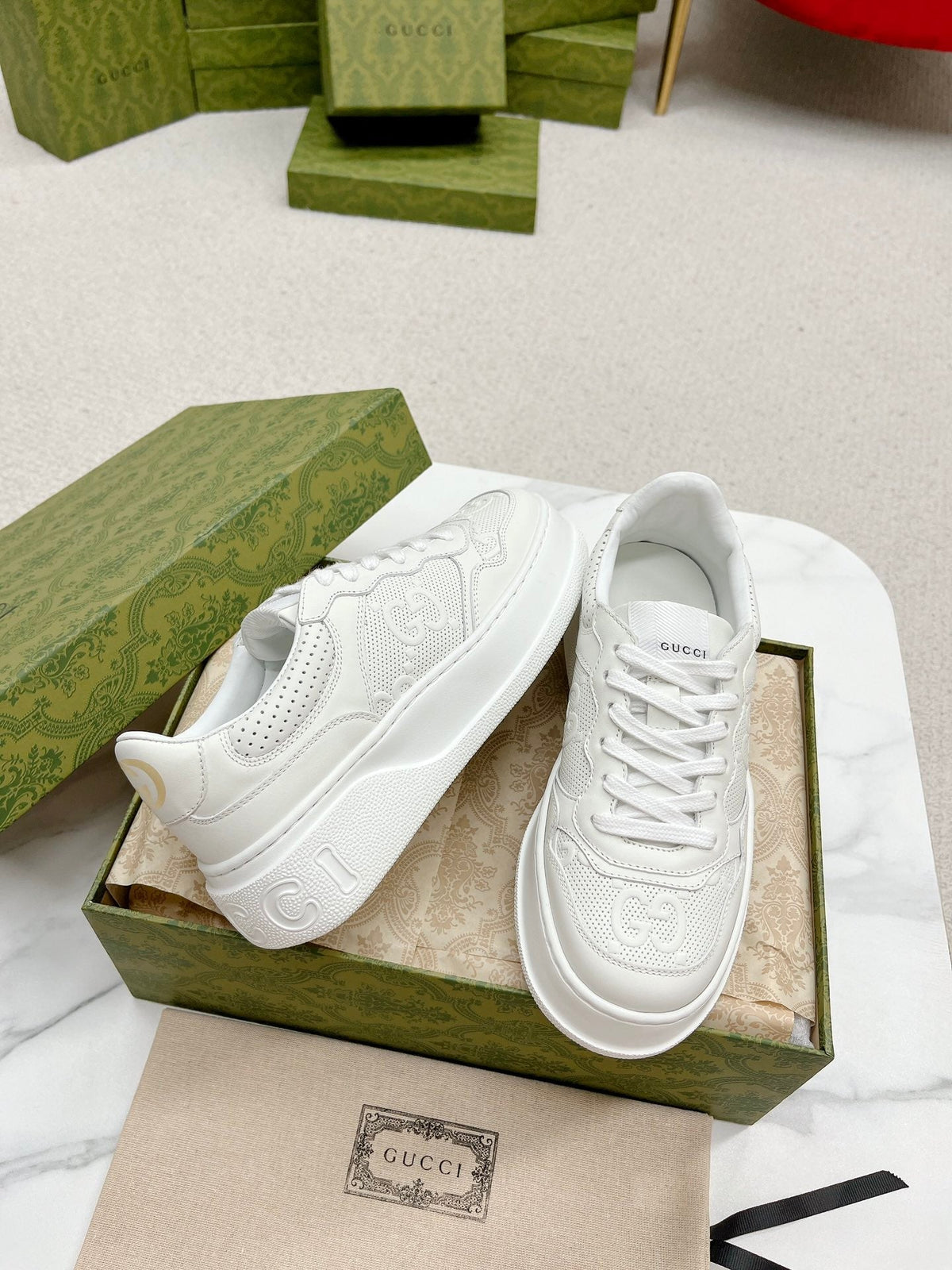 GUCCI EMBOSSED TRAINER WHITE CALFSKIN
