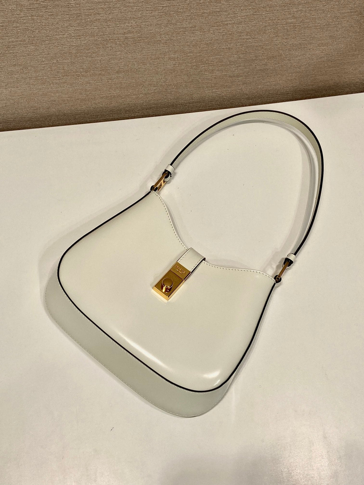 PRADA CLEO SHOULDER BAG 22 IN WHITE BRUSHED LAMBSKIN WITH CLASP CLOSURE