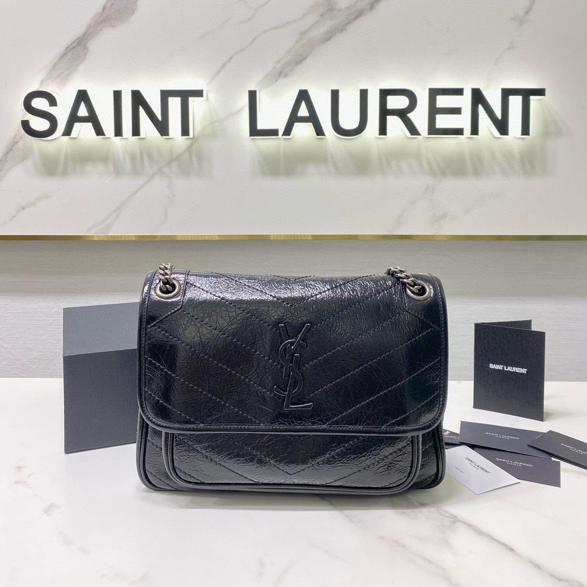 MEDIUM NIKI 28 IN BLACK CALFSKIN CHAIN BAG High-end