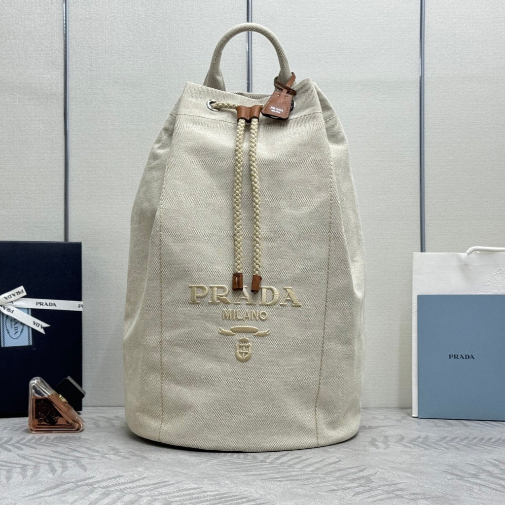 PRADA 25S DRAWSTRING BACKPACK 55 IN BEIGE CANVAS LINEN SILVER HARDWRE