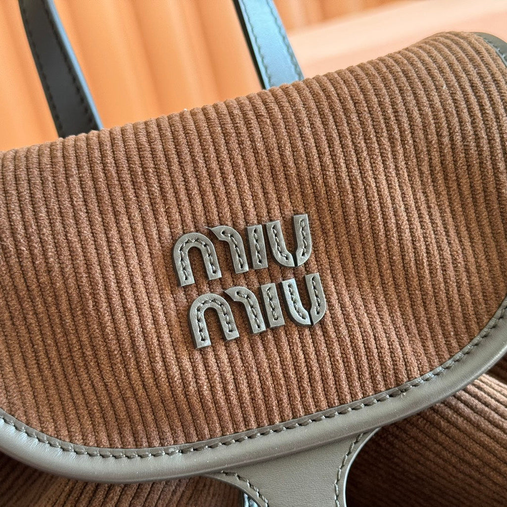 MIUMIU 26S MEDIUM BACKPACK 29 IN CHOCOLATE BROWN CANVAS BLACK CALFSKIN