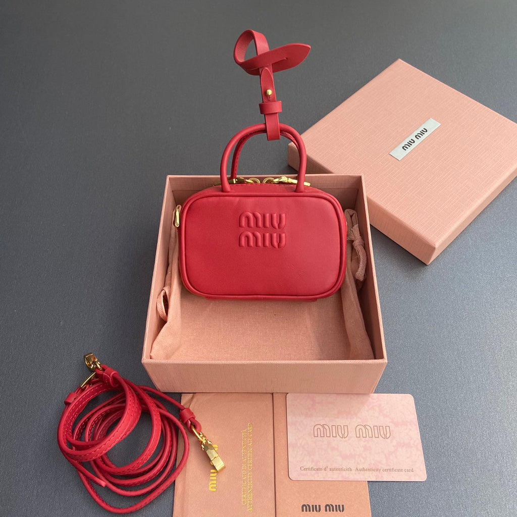 MICRO BAG KEYCHAIN 11 IN TALL POPPY RED CALFSKIN EMBOSSED LOGO