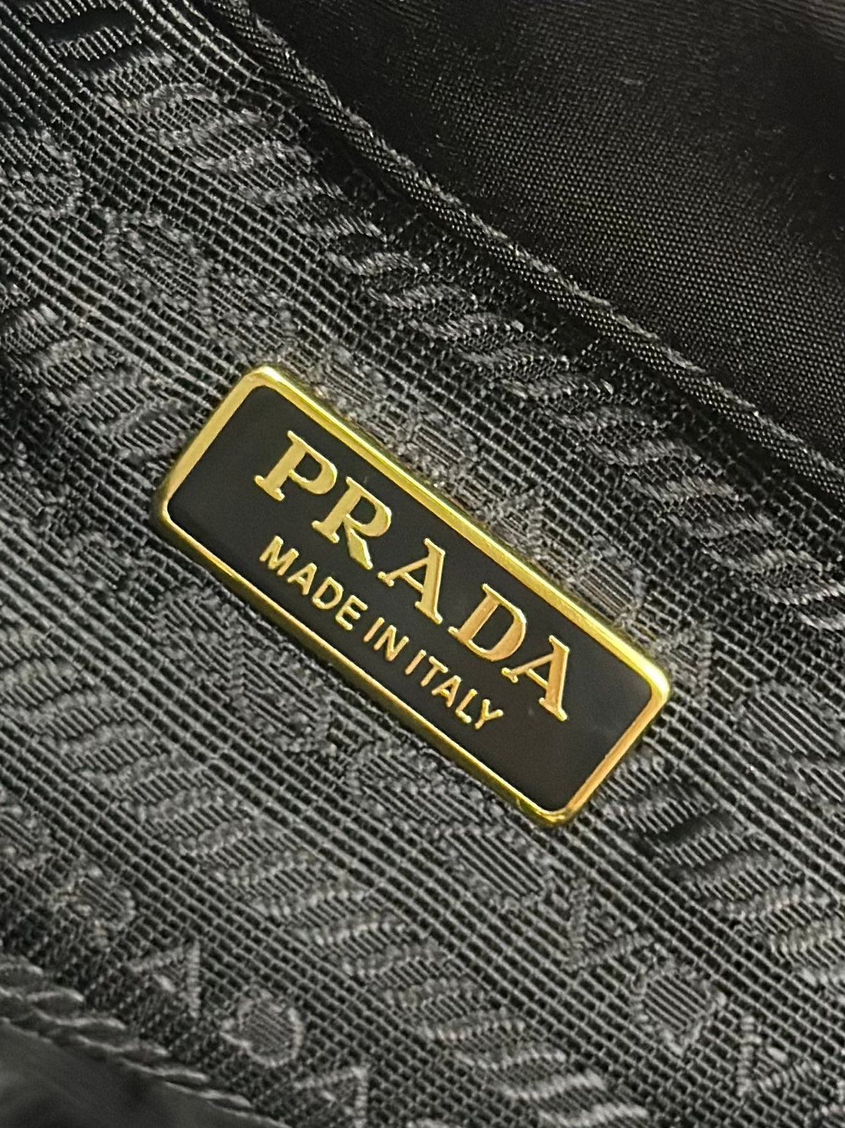 PRADA BUCKET BAG 19 IN BLACK RE-NYLON AND CALFSKIN HANDLE