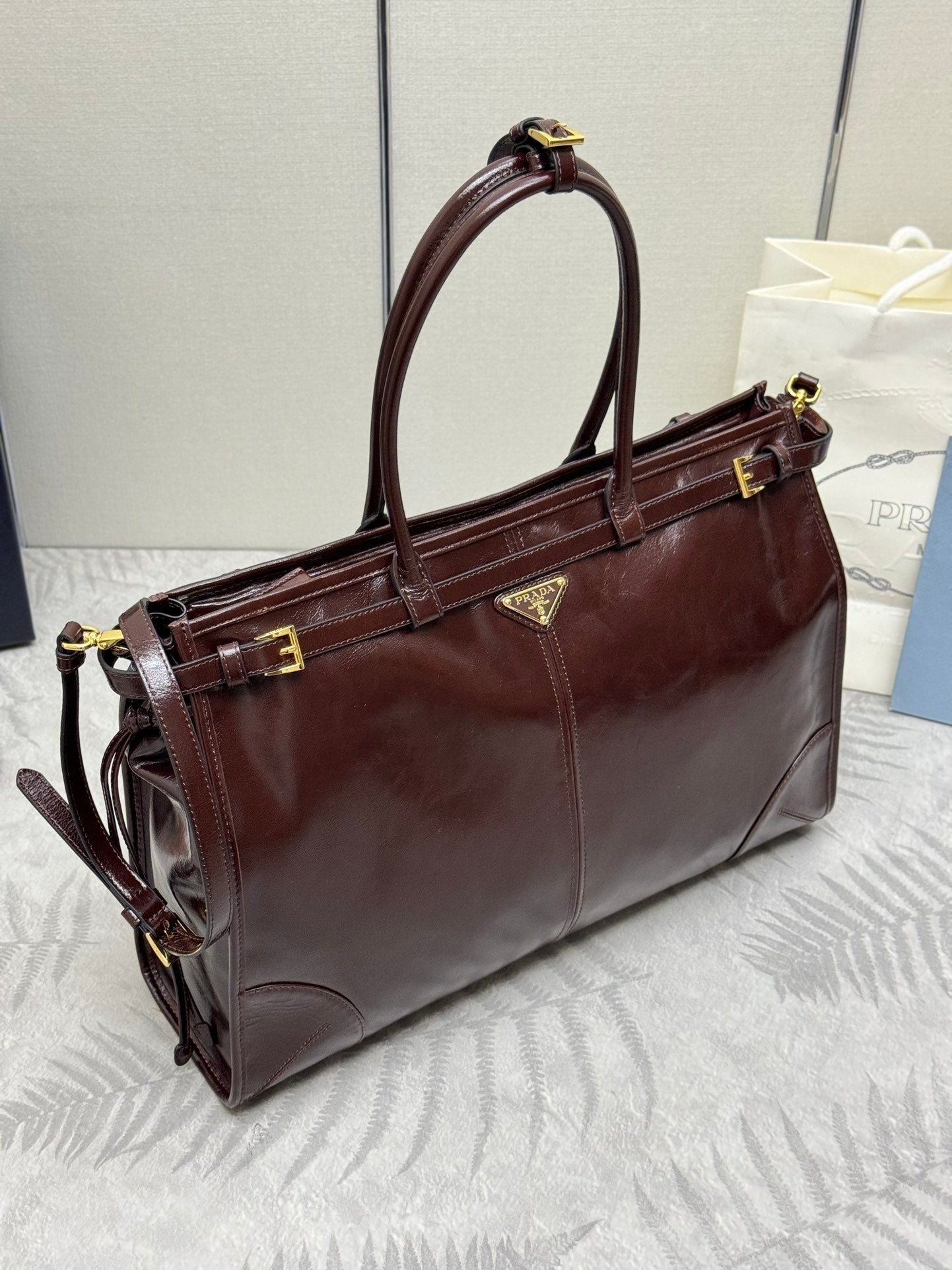 PRADA 25S BONNIE EXTRA-LARGE 42 IN RK BROWN GLOSSY CALFSKIN GOLD HARDWARE
